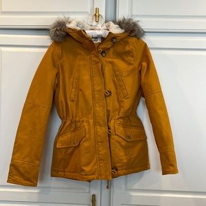 Winter coat. Mustard yellow. Quilted lining. Fleece hood with faux fur. Small.